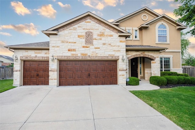 2713 Margarita Ct, Round Rock, TX 78665 - french country home featuring stone siding, driveway, a garage, and stucco siding
