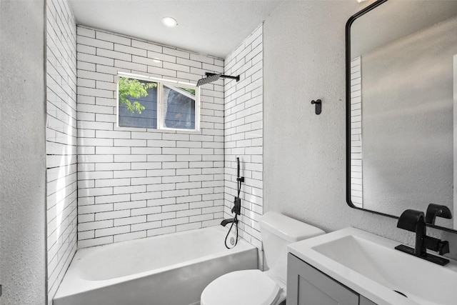 7000 Carwill Dr, Austin, TX 78724 - full bath with a textured wall, toilet, vanity, and bathing tub / shower combination