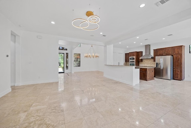 206 Lido St, Austin, TX 78734 - unfurnished living room with a chandelier, baseboards, and recessed lighting