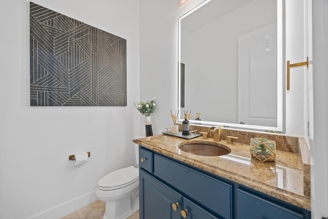 206 Lido St, Austin, TX 78734 - bathroom featuring toilet, vanity, tile patterned floors, and baseboards