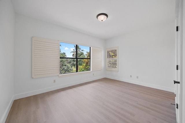 206 Lido St, Austin, TX 78734 - unfurnished room with light wood-style floors and baseboards