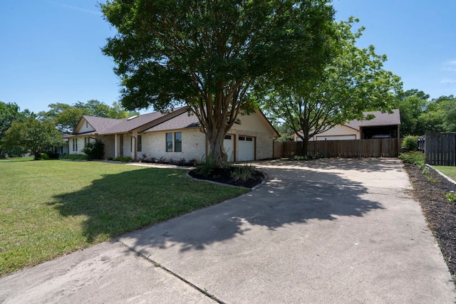 507 Canyon Wren Dr, Buda, TX 78610 - ranch-style house with concrete driveway, an attached garage, and brick siding