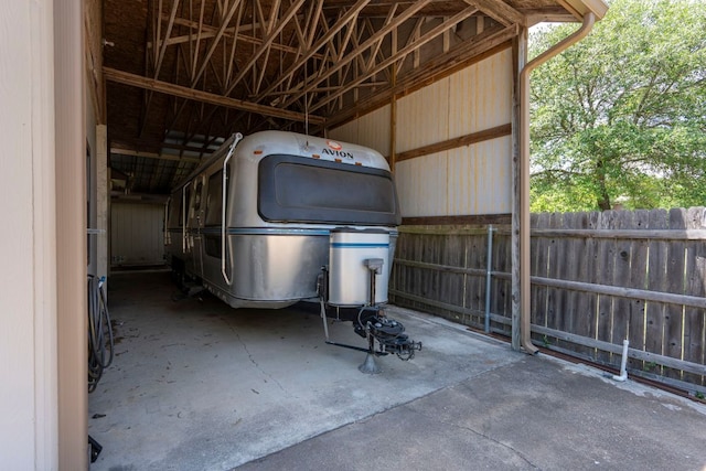 507 Canyon Wren Dr, Buda, TX 78610 - garage with fence and a carport