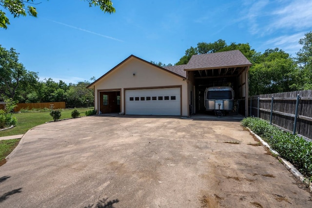 507 Canyon Wren Dr, Buda, TX 78610 - view of front facade with stucco siding, concrete driveway, and a shingled roof