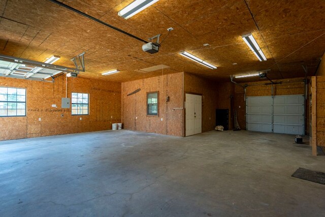 507 Canyon Wren Dr, Buda, TX 78610 - garage featuring a garage door opener and electric panel