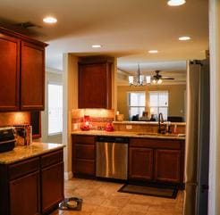 834 Salado Creek Ln, Georgetown, TX 78633 - kitchen featuring dishwasher, a sink, light countertops, recessed lighting, and light tile patterned flooring