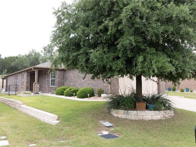 834 Salado Creek Ln, Georgetown, TX 78633 - view of front of house with brick siding and driveway