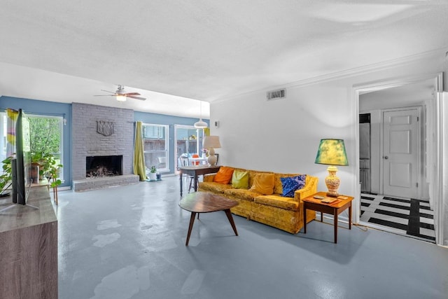 1605 Coronado Hills Dr Unit B, Austin, TX 78752 - living area with concrete flooring, healthy amount of natural light, a ceiling fan, a fireplace, and crown molding