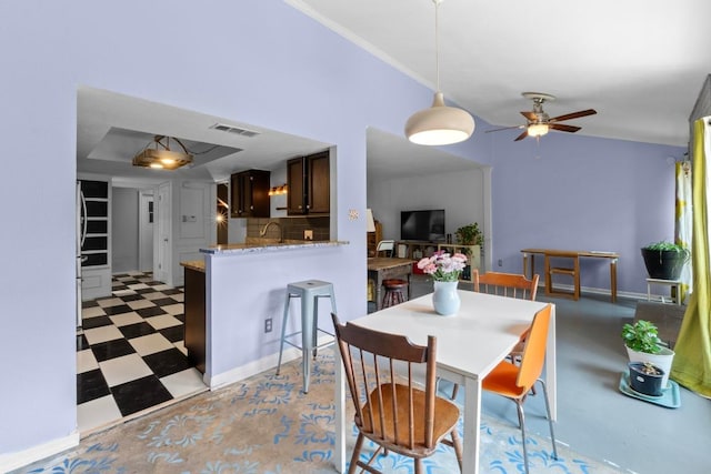 1605 Coronado Hills Dr Unit B, Austin, TX 78752 - dining area featuring ceiling fan, light flooring, and crown molding