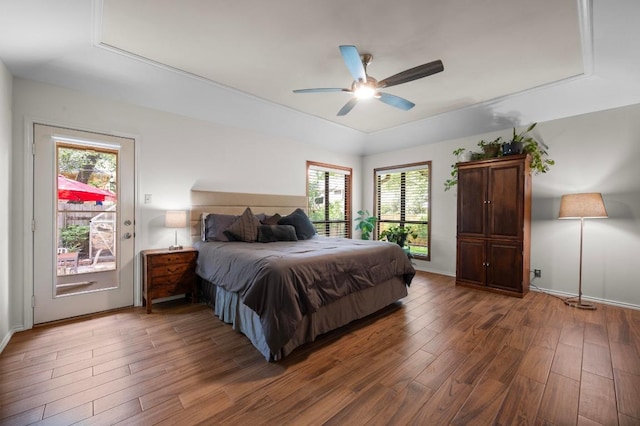 7303 Carlwood Dr, Austin, TX 78759 - bedroom featuring wood finished floors, multiple windows, and ceiling fan