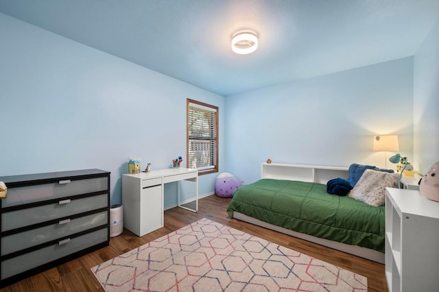 7303 Carlwood Dr, Austin, TX 78759 - bedroom featuring wood finished floors and baseboards