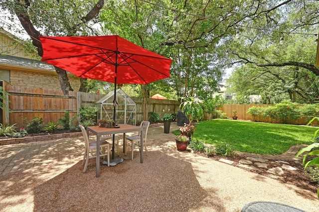 7303 Carlwood Dr, Austin, TX 78759 - view of patio / terrace with outdoor dining space and an exterior structure