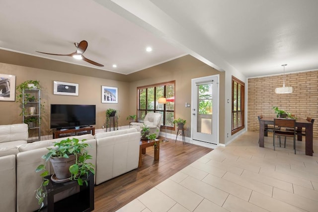 7303 Carlwood Dr, Austin, TX 78759 - living area featuring ceiling fan, brick wall, light wood finished floors, baseboards, and recessed lighting