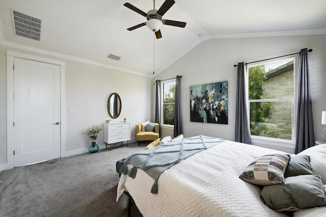 carpeted bedroom with lofted ceiling, a ceiling fan, and baseboards