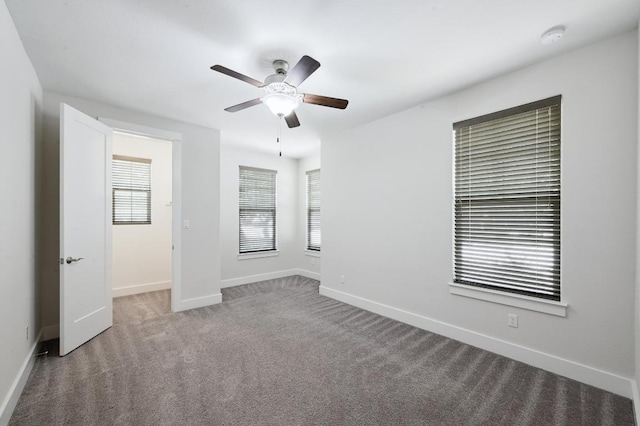 5303 Patagonia Pass, Austin, TX 78738 - spare room with ceiling fan, baseboards, carpet flooring, and a smoke detector