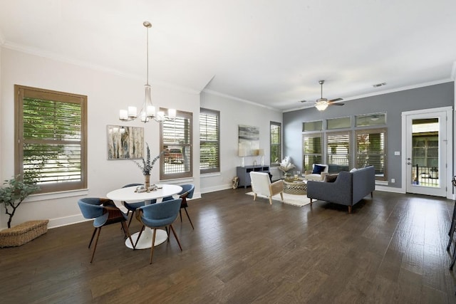 dining space with dark wood-style flooring, baseboards, a chandelier, ornamental molding, and a ceiling fan