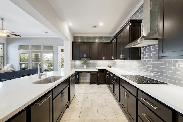 5303 Patagonia Pass, Austin, TX 78738 - kitchen featuring a sink, wall chimney range hood, black electric cooktop, light countertops, and open floor plan