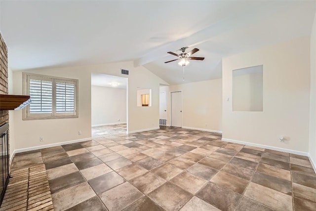 unfurnished living room with a brick fireplace, ceiling fan, and baseboards