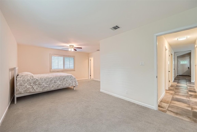 7815 Croftwood Dr, Austin, TX 78749 - carpeted bedroom with baseboards and ceiling fan