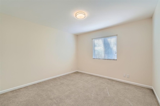 7815 Croftwood Dr, Austin, TX 78749 - carpeted spare room featuring baseboards