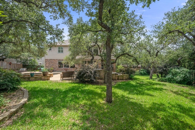 view of yard with a patio area
