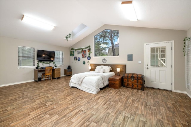 28920 Country Dr, New Braunfels, TX 78132 - bedroom with vaulted ceiling, wood finished floors, and baseboards