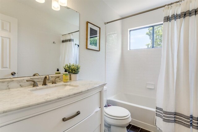 809 Meadowcreek Dr, Round Rock, TX 78664 - full bathroom featuring vanity, toilet, shower / bath combination with curtain, and tile patterned floors