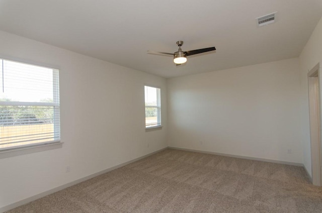 217 Deserti Rd, Leander, TX 78641 - spare room featuring light carpet and a ceiling fan