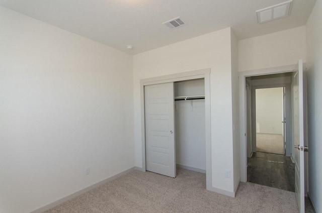 217 Deserti Rd, Leander, TX 78641 - unfurnished bedroom with light carpet, baseboards, and a closet