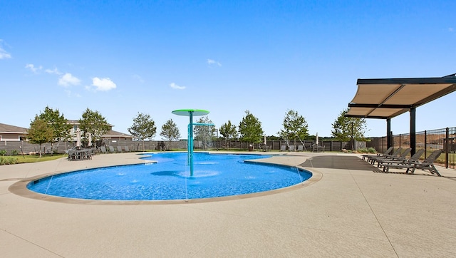 217 Deserti Rd, Leander, TX 78641 - community pool with fence and a patio