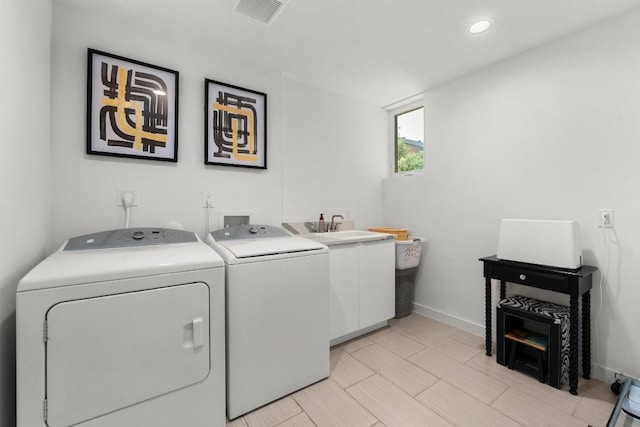 5728 Misty Hill Cv, Austin, TX 78759 - clothes washing area with cabinet space, separate washer and dryer, baseboards, and recessed lighting