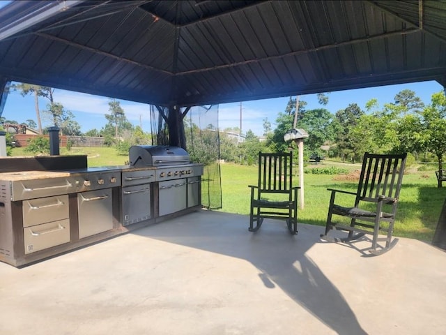 149 Mcallister Rd, Bastrop, TX 78602 - view of patio with exterior kitchen and grilling area