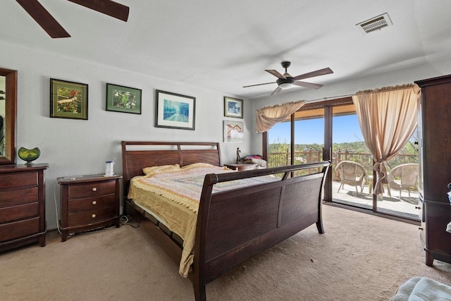 909 Redbud Trl, West Lake Hills, TX 78746 - carpeted bedroom featuring access to outside and ceiling fan