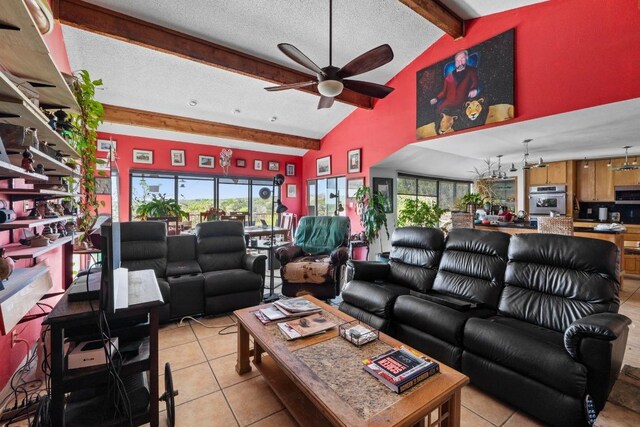 909 Redbud Trl, West Lake Hills, TX 78746 - living room with beam ceiling, ceiling fan, light tile patterned floors, a textured ceiling, and high vaulted ceiling