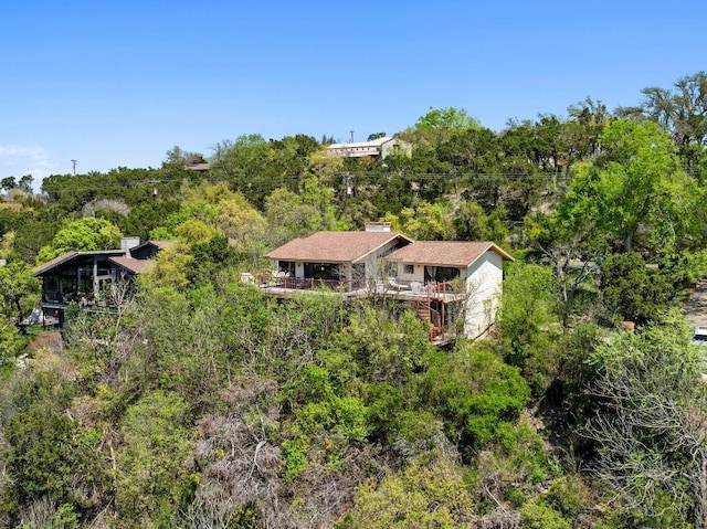 909 Redbud Trl, West Lake Hills, TX 78746 - aerial view of property and surrounding area with a heavily wooded area