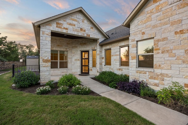 2761 Fishing Hole Cv, Leander, TX 78641 - contemporary house featuring stone siding and roof with shingles