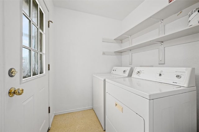 1727 Leander St, Georgetown, TX 78626 - laundry room with independent washer and dryer, baseboards, and light flooring
