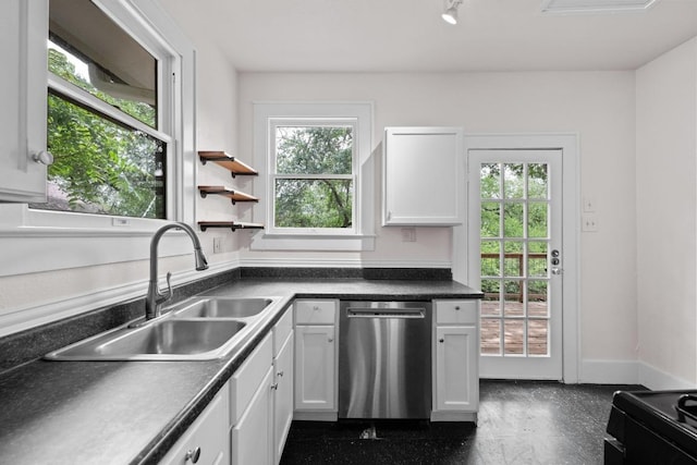 713 Patterson Ave, Austin, TX 78703 - kitchen with dishwasher, a sink, white cabinetry, dark countertops, and baseboards