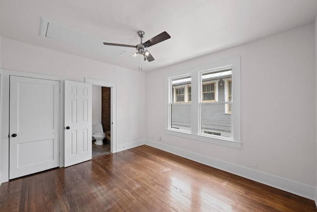 713 Patterson Ave, Austin, TX 78703 - unfurnished bedroom with wood finished floors, connected bathroom, and ceiling fan