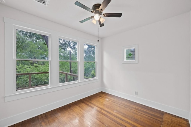713 Patterson Ave, Austin, TX 78703 - empty room with baseboards, hardwood / wood-style floors, and ceiling fan