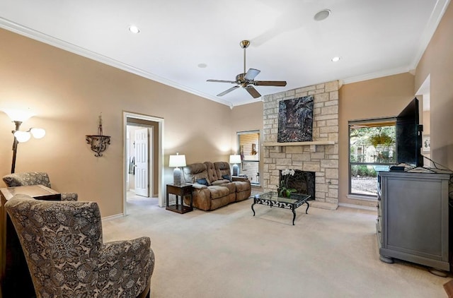 217 Fox Xing, Burnet, TX 78611 - living area featuring light colored carpet, crown molding, a ceiling fan, a stone fireplace, and baseboards