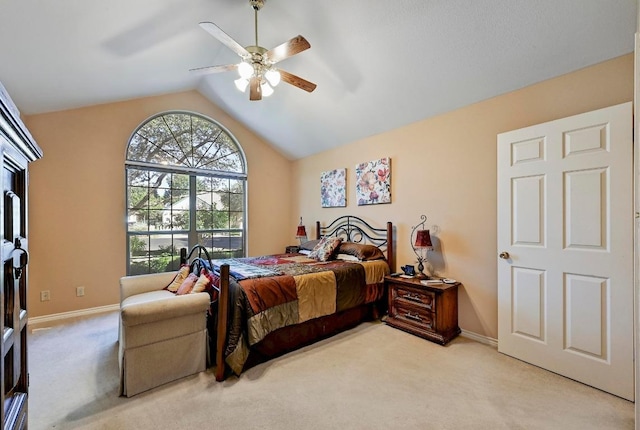 217 Fox Xing, Burnet, TX 78611 - bedroom with light carpet, lofted ceiling, baseboards, and a ceiling fan