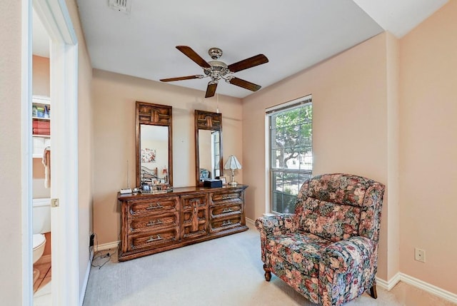 217 Fox Xing, Burnet, TX 78611 - sitting room featuring a ceiling fan, carpet floors, and baseboards