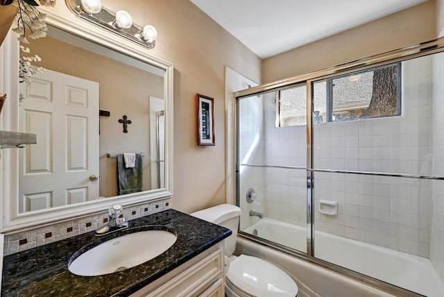 217 Fox Xing, Burnet, TX 78611 - full bathroom with toilet, combined bath / shower with glass door, and vanity