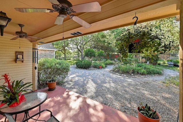 217 Fox Xing, Burnet, TX 78611 - view of patio featuring a ceiling fan and fence