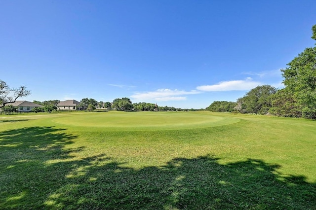217 Fox Xing, Burnet, TX 78611 - surrounding community with view of golf course and a yard