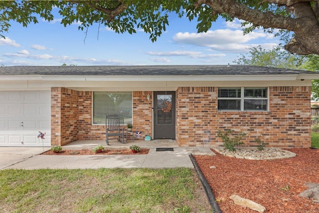 1611 Velma Ave, Copperas Cove, TX 76522 - ranch-style home with an attached garage, a porch, and brick siding