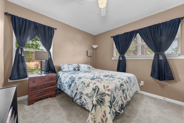 1611 Velma Ave, Copperas Cove, TX 76522 - bedroom with carpet, multiple windows, baseboards, and a ceiling fan