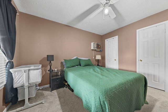 1611 Velma Ave, Copperas Cove, TX 76522 - carpeted bedroom with a ceiling fan, a textured ceiling, and baseboards