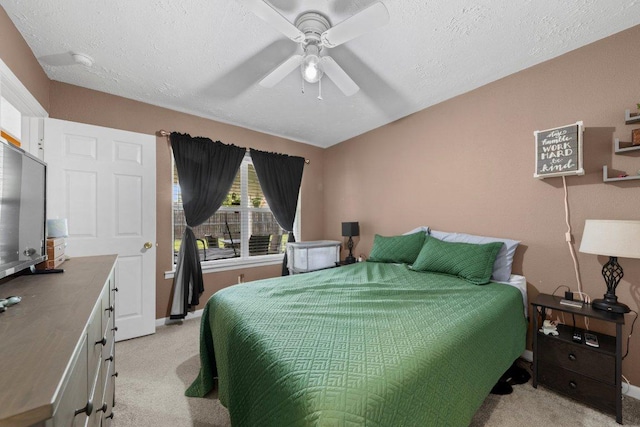 1611 Velma Ave, Copperas Cove, TX 76522 - bedroom featuring light carpet, baseboards, ceiling fan, and a textured ceiling